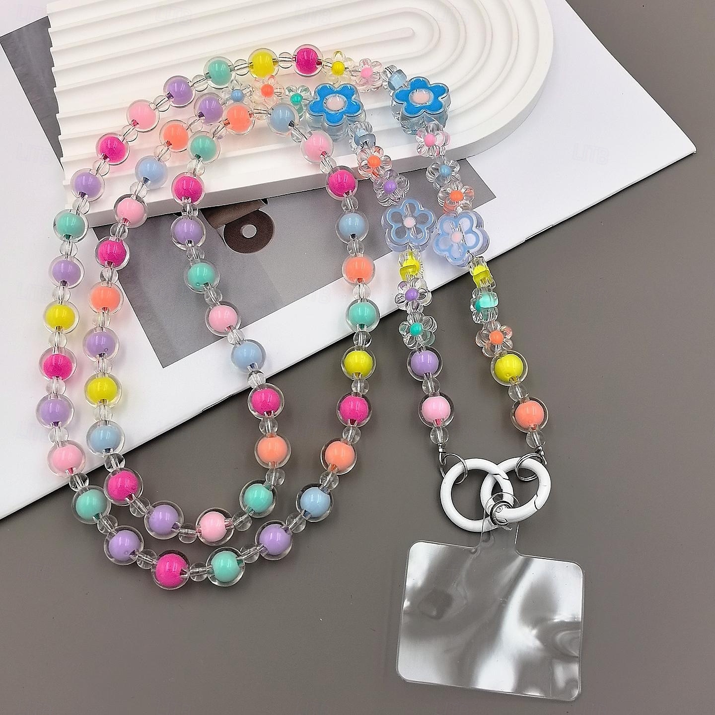 Nuova varietà di custodie per telefono con fiori colorati, con catena a croce diagonale, perline in acrilico, tracolla singola, corda per appendere il telefono, ciondolo di perle per donna del 2025 a $13.99 –P3