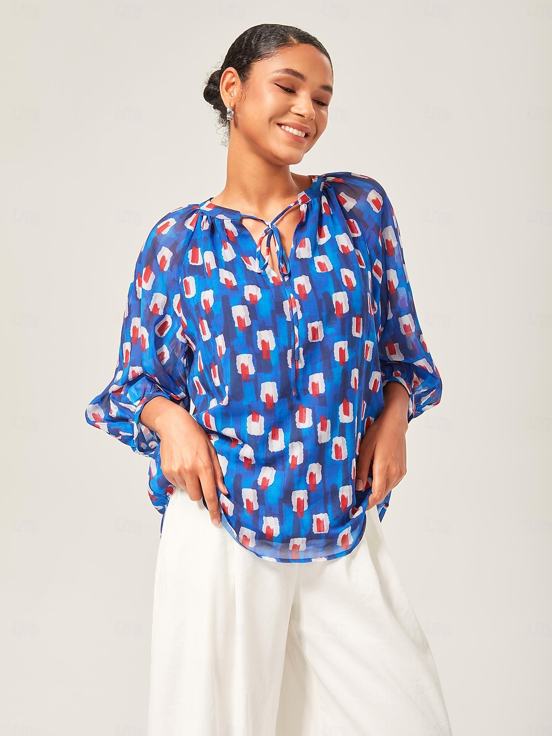 top con maniche a lanterna in chiffon geometrico del 2025 a $57.99 –P1