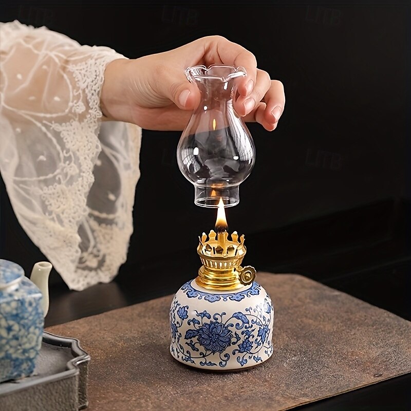 una lampada a combustibile da campeggio regolabile per esterni, una lampada a olio per uso domestico, una lampada a olio floreale in ceramica blu e bianca per interni, una lampada a cherosene con del 2025 a $68.99 –P4