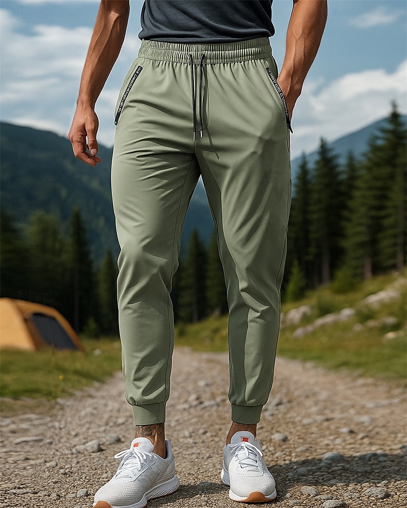 Herren Wanderhosen Trainingshose Außen Normale Passform Wasserdicht Winddicht Atmungsaktiv Schnelltrocknend Hosen Elastischer Bund Schwarz Dunkelgrün Camping / Wandern Golfspiel Laufen XS S M L XL 2025 - $13.99 –P1