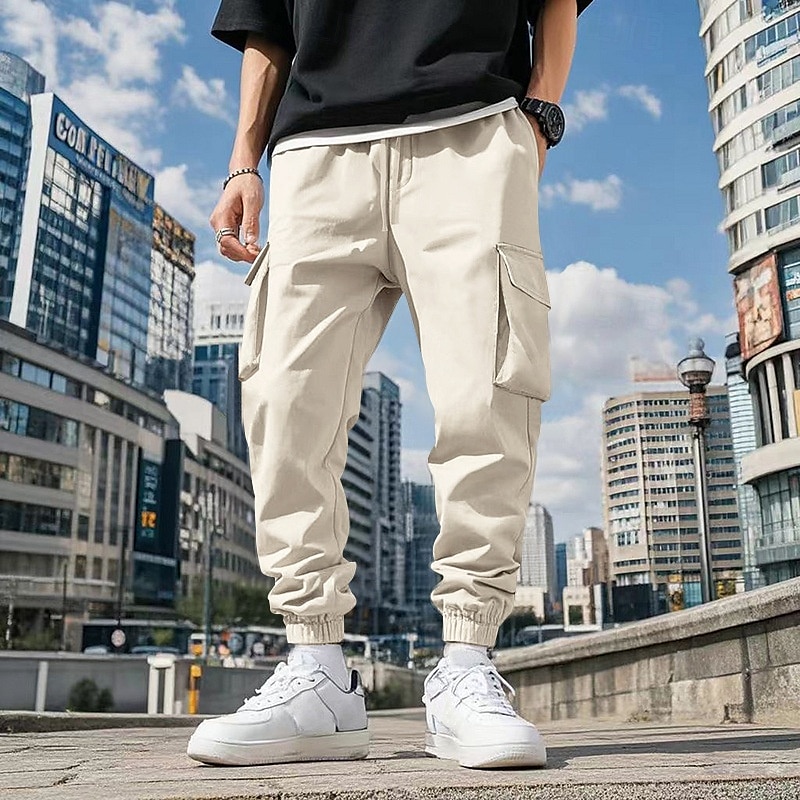 Homme Pantalons Cargo Pantalon Jogger Pantalons Cordon de serrage Taille Élastique Multi-poches Uni Portable Extérieur Quotidien Camping & Randonnée Mode Classique Noir Blanche de 2025 ? $24.99 –P17