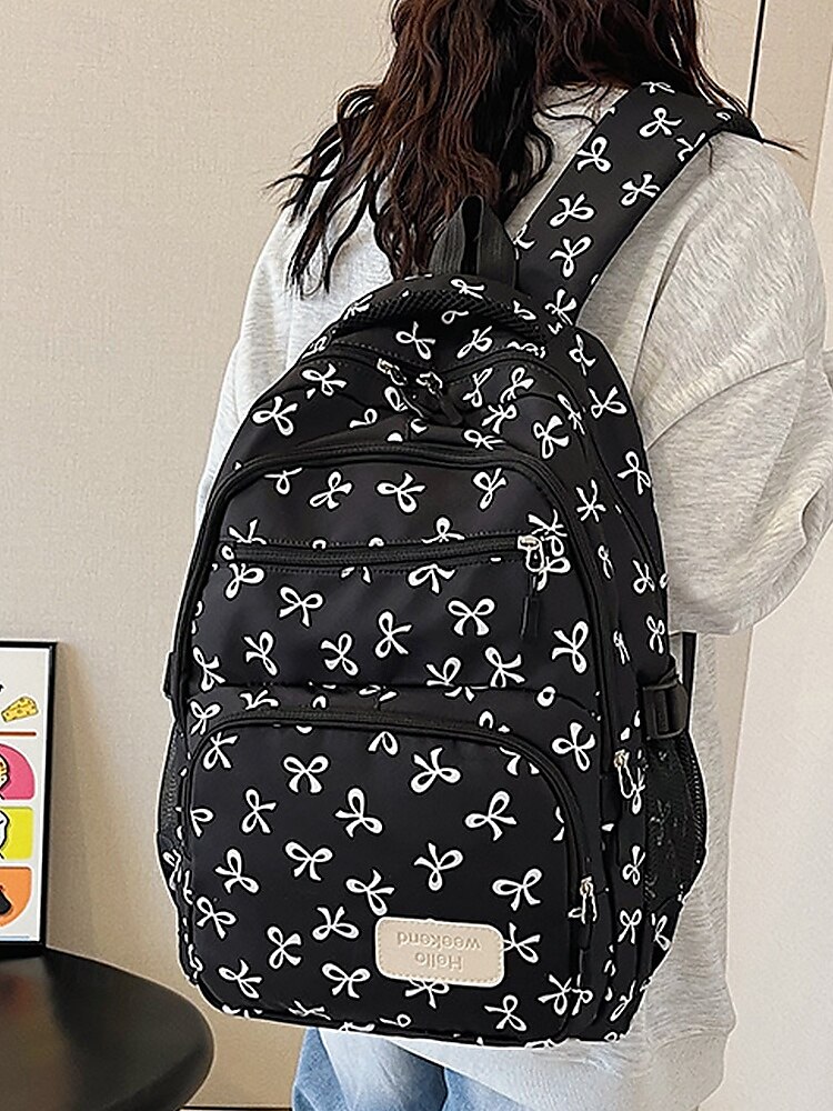 Set di 3 zaini scolastici per ragazze adolescenti: zaino in tela leggero con stampa di un grazioso fiocco rosa, borsa a tracolla di grande capacità e astuccio per matite, perfetto per la scuola, i viaggi e l'uso quotidiano. del 2025 a $26.99 –P3