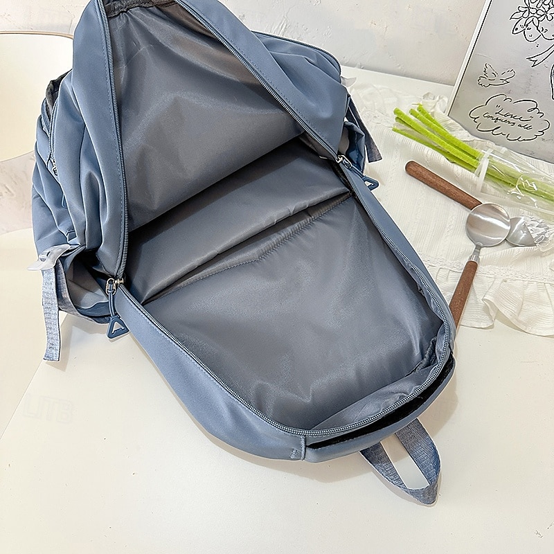 Sac à dos d'école noir pour adolescent avec motif patch et pochette – sac à dos élégant pour les collégiens et les lycéens, prêt pour la rentrée de 2025 ? $29.99 –P4