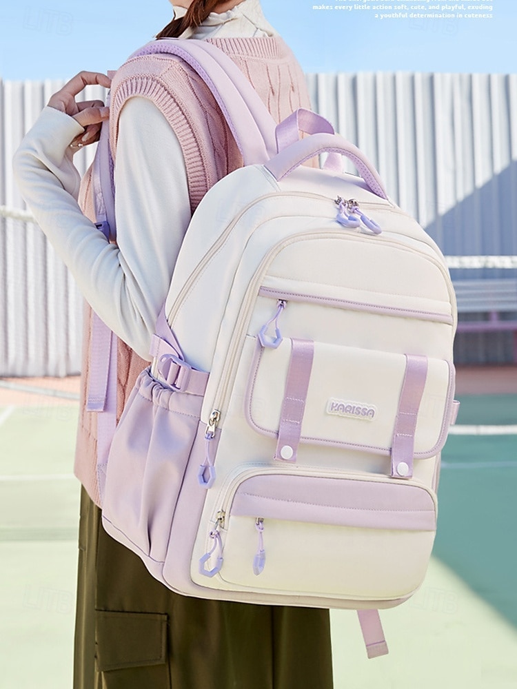 Sac à dos imperméable multi-poches - sac d'école de grande capacité, rangement en couches, design léger, poches latérales, adapté aux étudiants adolescents et aux navetteurs quotidiens noir rose bleu de 2025 ? $34.99 –P1