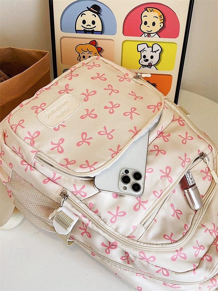 Set di 3 zaini scolastici per ragazze adolescenti: zaino in tela leggero con stampa di un grazioso fiocco rosa, borsa a tracolla di grande capacità e astuccio per matite, perfetto per la scuola, i viaggi e l'uso quotidiano. del 2025 a $26.99 –P9