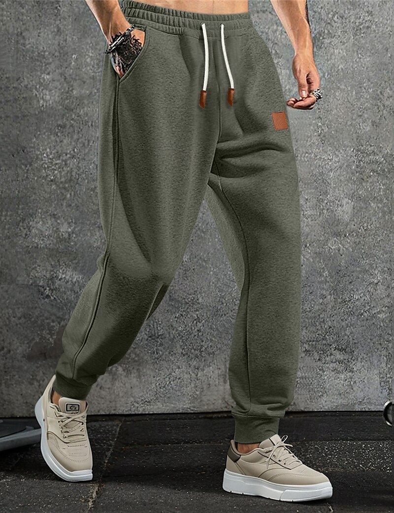 Homme Pantalon en polaire Joggings Joggeurs Pantalon Jogger Pantalons Cordon de serrage Uni Confort Doux Longueur complète Extérieur Quotidien Sortir Vacances Mode Noir bleu marine Élastique de 2025 ? $17.99 –P3