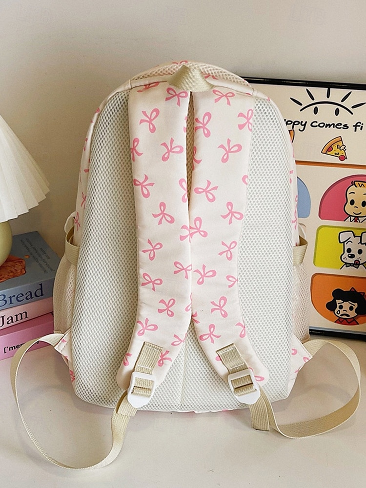 Set di 3 zaini scolastici per ragazze adolescenti: zaino in tela leggero con stampa di un grazioso fiocco rosa, borsa a tracolla di grande capacità e astuccio per matite, perfetto per la scuola, i viaggi e l'uso quotidiano. del 2025 a $26.99 –P7