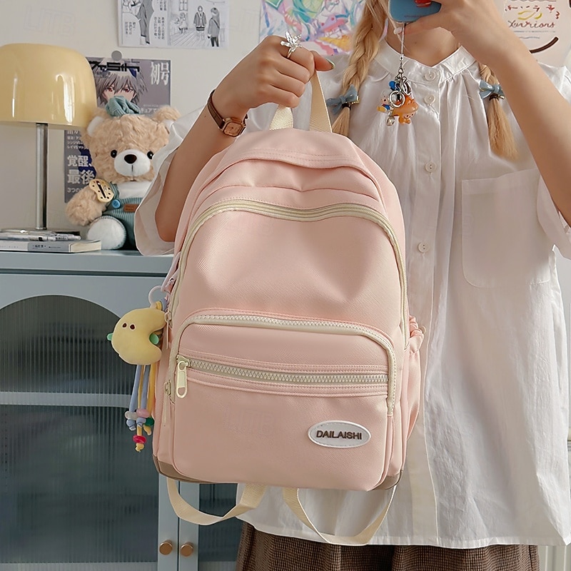 Sac à dos rose pour fille, idéal pour l'école et le quotidien – cartable léger avec poche zippée sur le devant, idéal pour les adolescentes et les étudiants. de 2025 ? $29.99 –P2