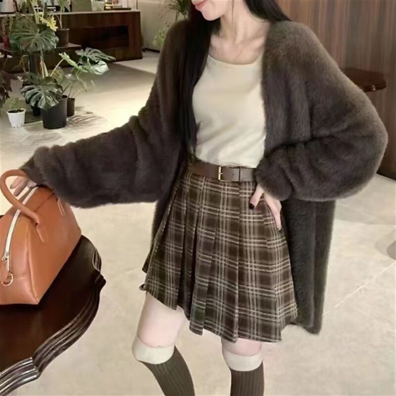 Femmes Pull Cardigan Mode Streetwear Quotidien Couleur Unie Côtelé Ouvert devant Tricoté manche longue Hauts Longs Tricoter Fête Sortir Week-end Blanche Rose Claire Automne Hiver de 2025 ? $34.99 –P7