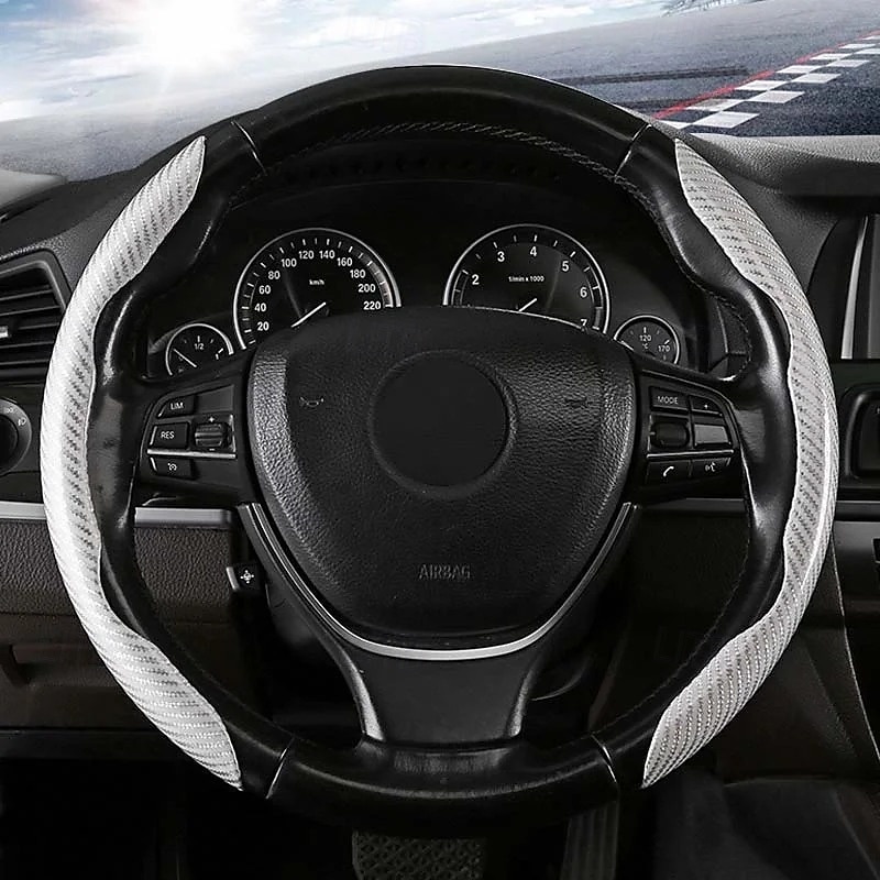 Funda antideslizante de silicona y fibra de carbono para volante de coche, ajuste universal, elegante, antideslizante, con agarre suave, para la decoración interior del coche y un cómodo accesorio de conducción. 2026 - $19.99 –P12