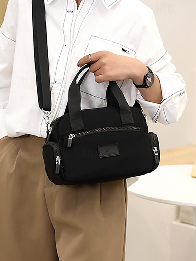 Női Crossbody táska Vállon átvetős táska Válltáskák Műanyag Hétköznapi Alkalmi / Napi Cipzár Több zsebbel Nagy kapacitás Könnyű Tömör szín Stétszürke Fekete Rózsaszín 2025 - $19.99 –P11