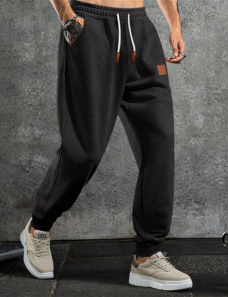 Homme Pantalon en polaire Joggings Joggeurs Pantalon Jogger Pantalons Cordon de serrage Uni Confort Doux Longueur complète Extérieur Quotidien Sortir Vacances Mode Noir bleu marine Élastique de 2025 ? $17.99 –P4