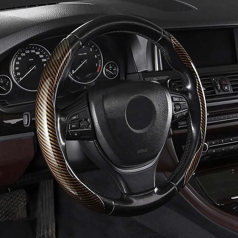 Funda antideslizante de silicona y fibra de carbono para volante de coche, ajuste universal, elegante, antideslizante, con agarre suave, para la decoración interior del coche y un cómodo accesorio de conducción. 2026 - $19.99 –P1