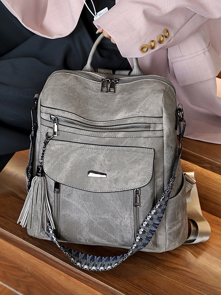 Sac à dos convertible en similicuir pour femme – Sac à bandoulière vintage multi-poches avec pompon pour les déplacements quotidiens, les voyages et le travail de 2025 ? $34.99 –P1
