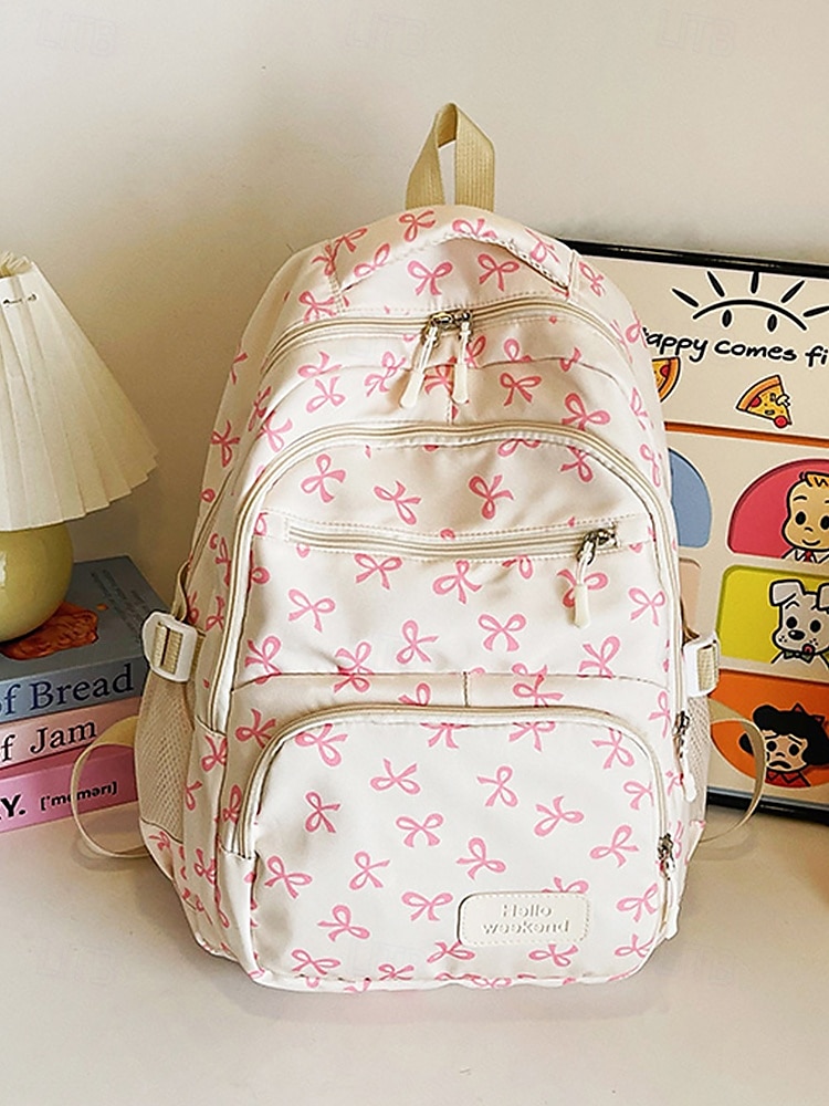 Set di 3 zaini scolastici per ragazze adolescenti: zaino in tela leggero con stampa di un grazioso fiocco rosa, borsa a tracolla di grande capacità e astuccio per matite, perfetto per la scuola, i viaggi e l'uso quotidiano. del 2025 a $26.99 –P6