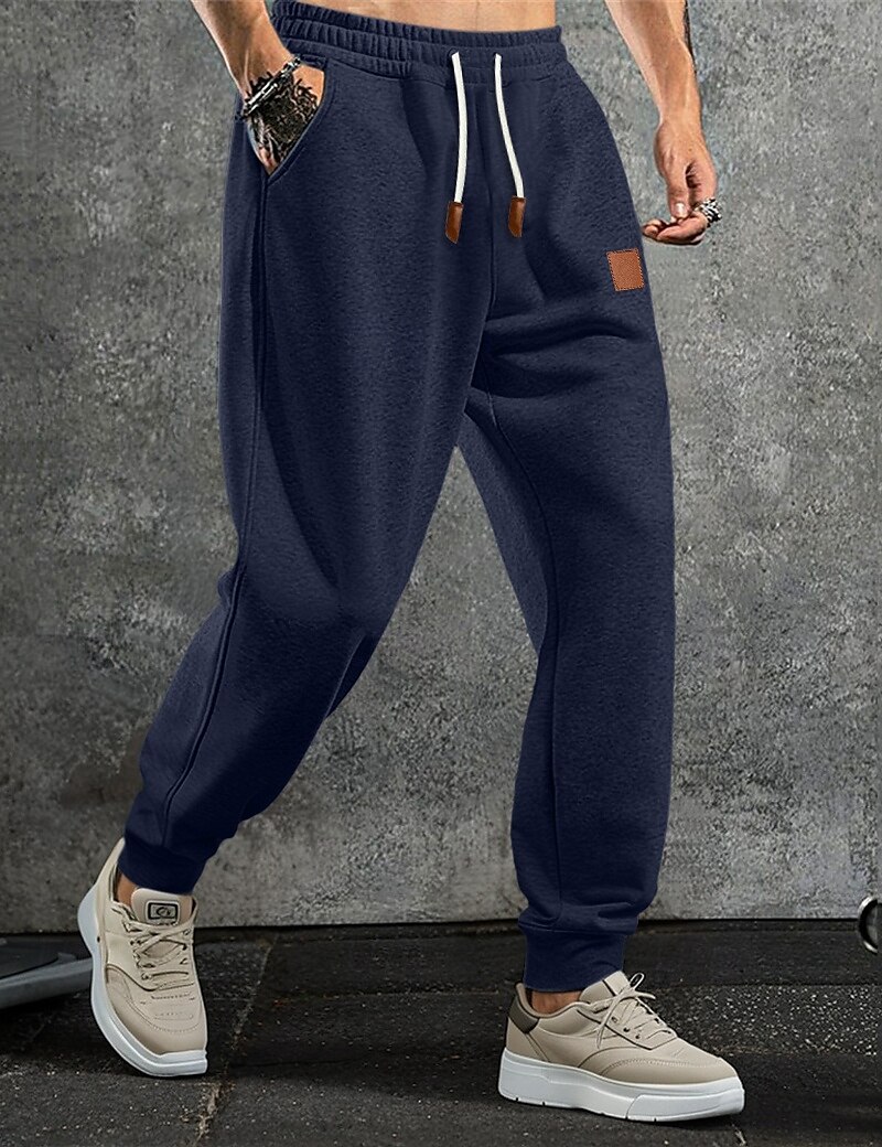 Homme Pantalon en polaire Joggings Joggeurs Pantalon Jogger Pantalons Cordon de serrage Uni Confort Doux Longueur complète Extérieur Quotidien Sortir Vacances Mode Noir bleu marine Élastique de 2025 ? $17.99 –P2