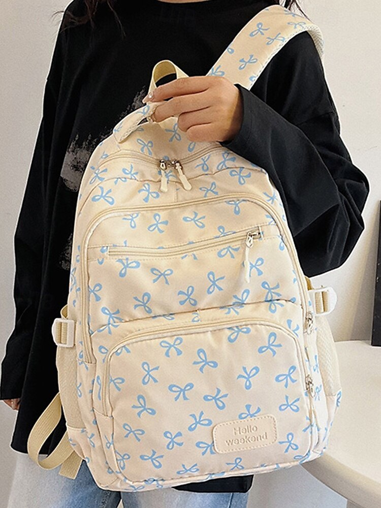 Set di 3 zaini scolastici per ragazze adolescenti: zaino in tela leggero con stampa di un grazioso fiocco rosa, borsa a tracolla di grande capacità e astuccio per matite, perfetto per la scuola, i viaggi e l'uso quotidiano. del 2025 a $26.99 –P2
