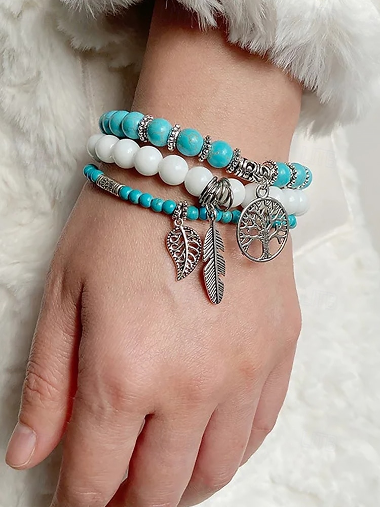 Set di bracciali da donna in stile boho con perline turchesi, con ciondolo a forma di albero della vita e piuma, elastico, perline in pietra naturale, adatti per abbigliamento casual, feste e regali. del 2025 a $9.99 –P1
