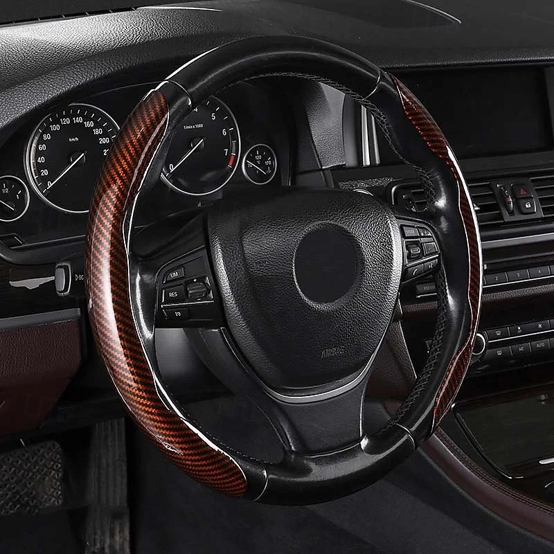 Funda antideslizante de silicona y fibra de carbono para volante de coche, ajuste universal, elegante, antideslizante, con agarre suave, para la decoración interior del coche y un cómodo accesorio de conducción. 2026 - $19.99 –P4