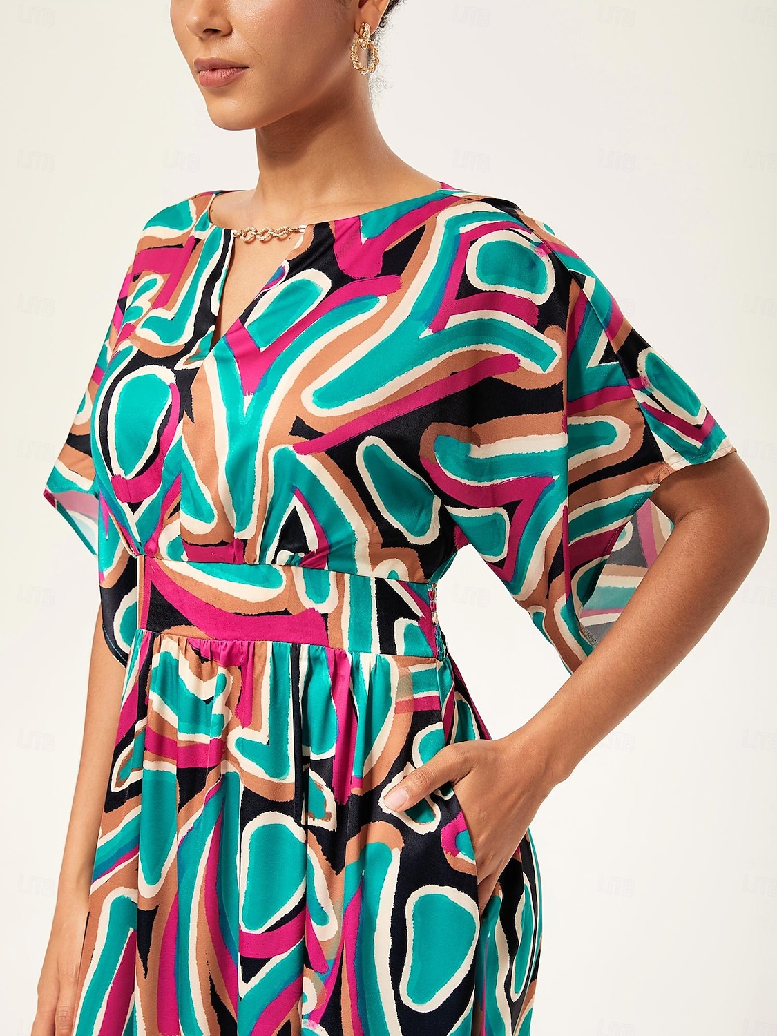 robe longue cintrée à manches chauve-souris abstraites et colorées de 2025 ? $71.99 –P9