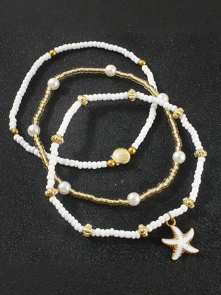 3-delat pärlhängesset för kvinnor – guldlegering och vita pärlor med sjöstjärnor och snäckor, bohemiska strandsmycken för sommarsemester och vardagliga outfits 2026 - $7.99 –P6