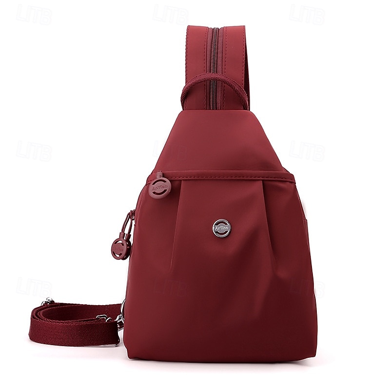 Bolso de viaje impermeable de dos vías, mini mochila para mujer 2025, bolso de pecho de tela Oxford antirrobo, mochila informal de moda para el hombro. 2026 - $30.99 –P12