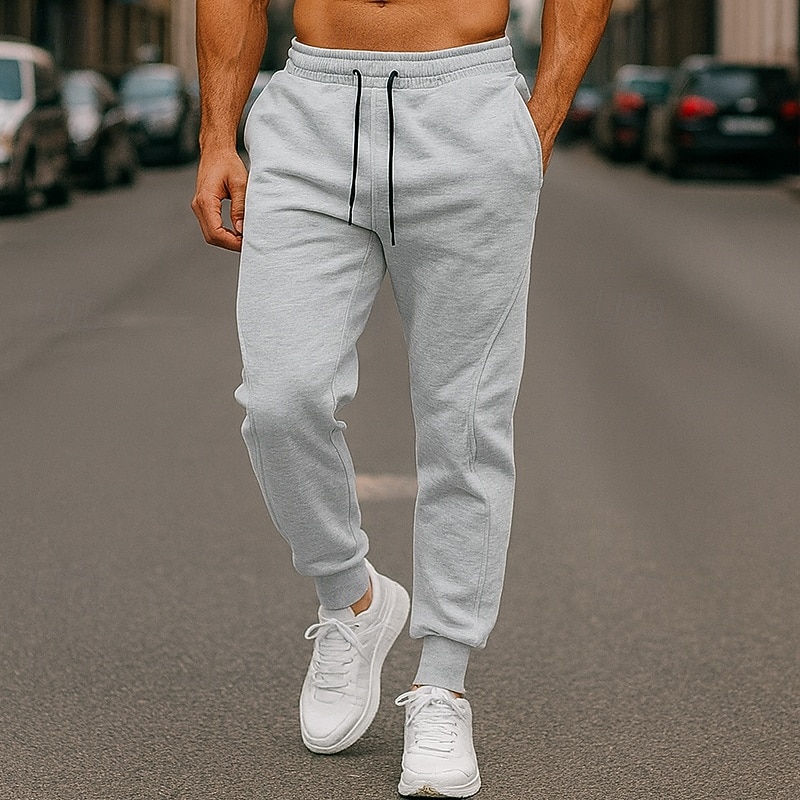 Męskie Spodnie dresowe Uprawiający jogging Spodnie sportowe Spodnie Spodnie codzienne Ściągana na sznurek Kieszeń Elastyczny pas Solidne kolory Odprowadza wilgoć Oddychający Pełna długość Na zewnątrz 2026 - $20.99 –P1