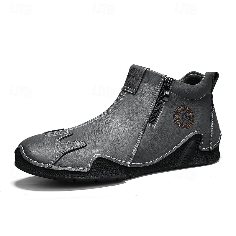 Miesten ruskeat nahkaiset vetoketjulliset slip-on-kengät ainutlaatuisella pyöreällä kärjellä ja joustavalla pohjalla – retrohenkiset vapaa-ajan kengät matkoille, töihin ja jokapäiväiseen mukavuuteen. 2026 - $59.99 –P3