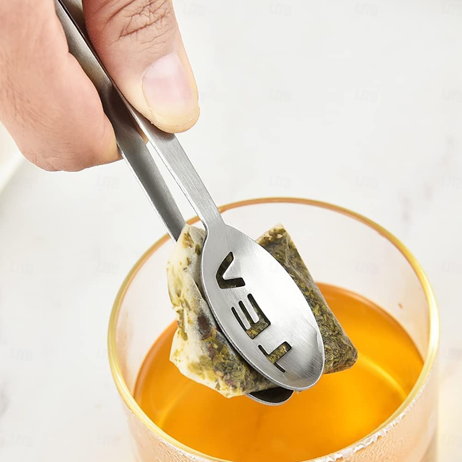 Espremedor de saquinhos de chá de aço inoxidável, suporte para saquinhos de chá, clipe para filtro, colher para saquinhos de chá, pinça para saquinhos de chá para chá a granel, pegador de cubos de de 2026 por $9.99 –P6