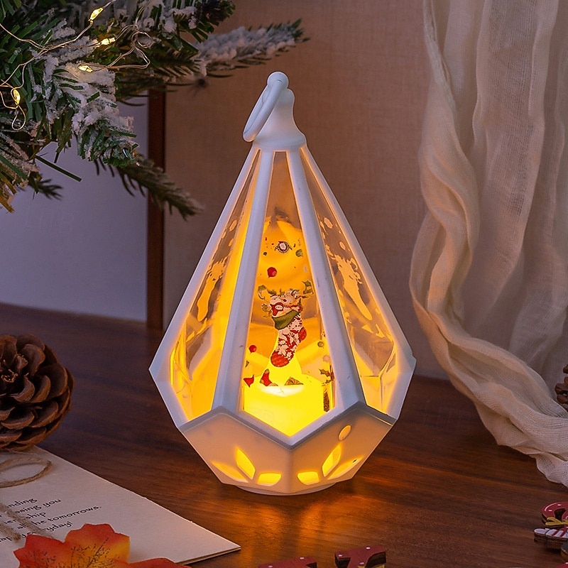 1 pieza 16 * 9,6 cm luz de vela iluminada LED navideña, linterna de mano, luz de adorno de decoración de mesa de reunión interior y exterior, luz colgante de luz de viento lr1130 * 3 baterías 2025 - $4.49 –P5