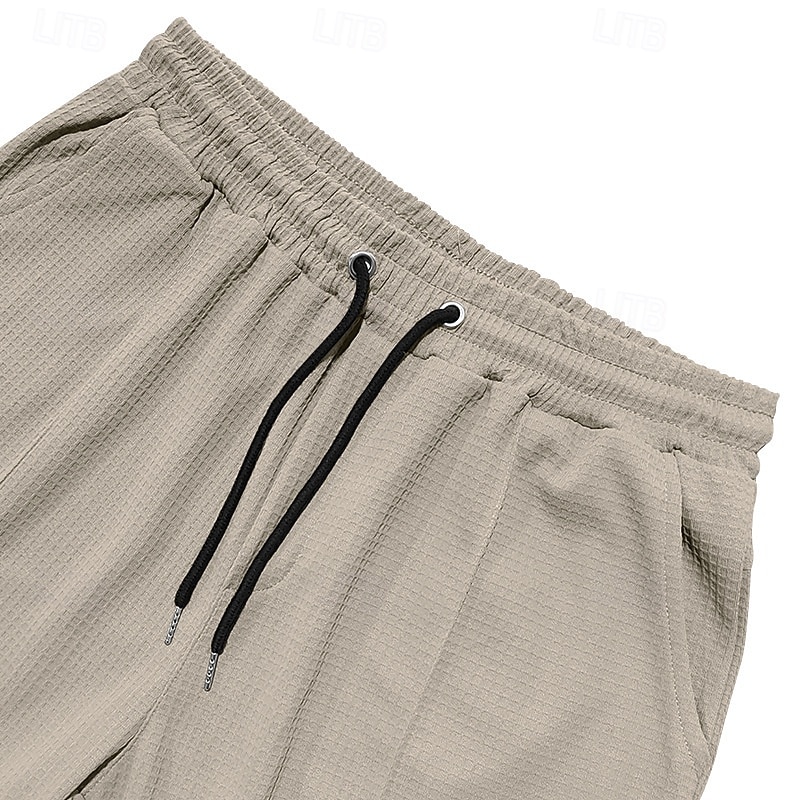 Homme Gauffré Pantalons Pantalons Amples Boutons Uni Portable Longueur complète Extérieur Quotidien Camping & Randonnée Vacances Mode Noir Blanche de 2025 ? $21.99 –P13