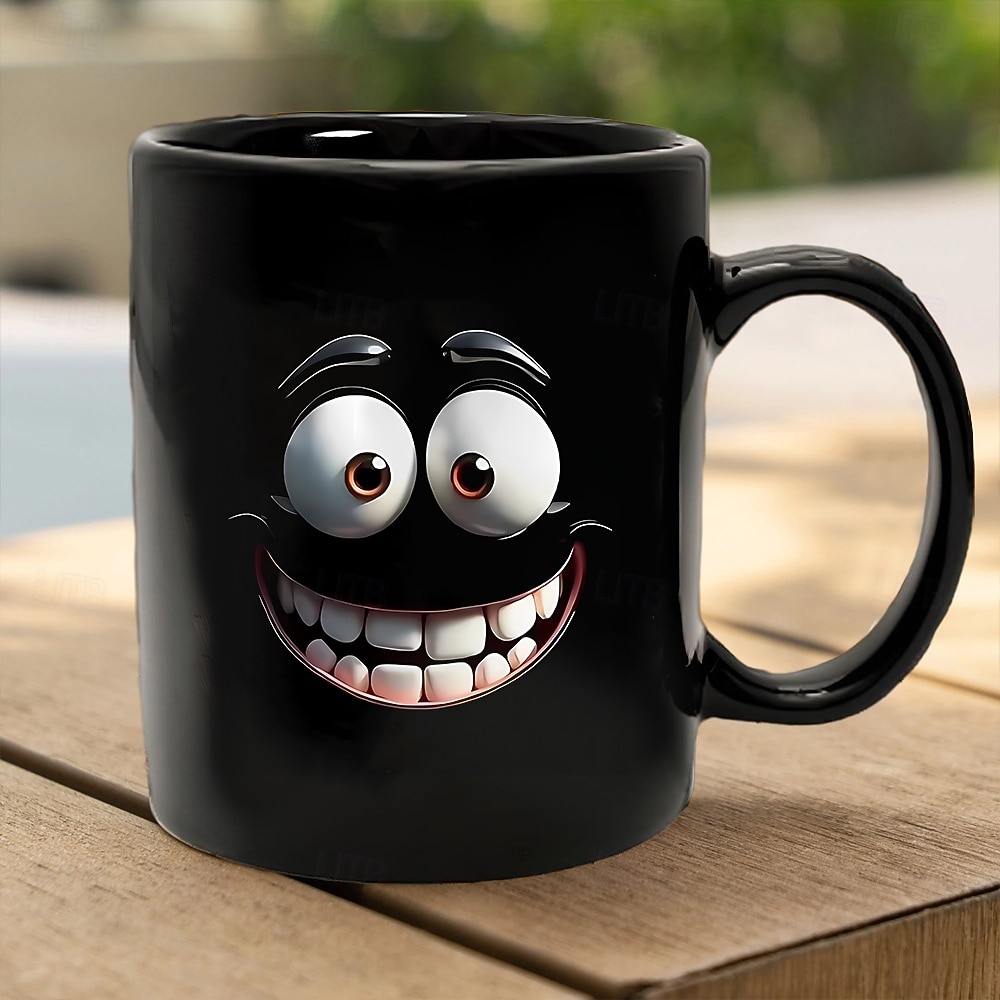 Tasse à café noire amusante avec un grand visage de dessin animé souriant, tasse à thé en céramique de 12 oz, cadeau pour le bureau, la maison, les amis, nouveauté, cadeau d'anniversaire ou de de 2026 ? $16.99 –P3