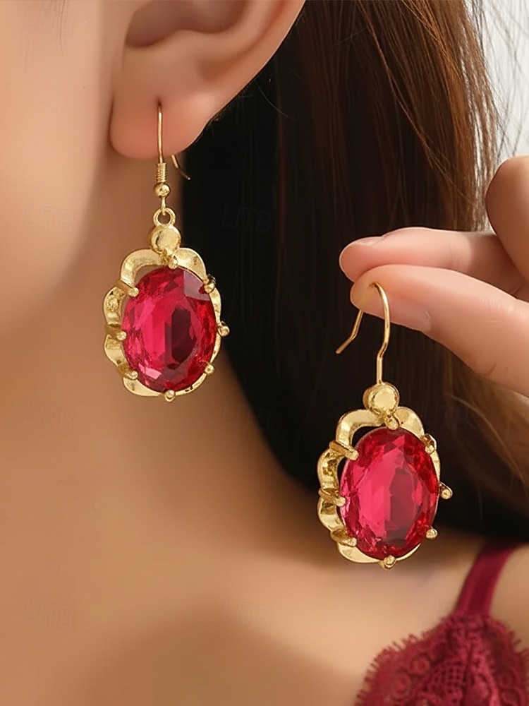 Boucles d'oreilles pendantes de Noël pour femmes avec de grandes pierres précieuses en cristal ovales, bijoux pendants élégants de couleur dorée, accessoires de fête festifs de 2025 ? $7.99 –P1
