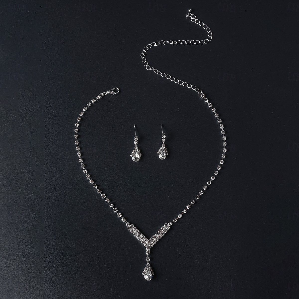 Elegancki srebrny komplet biżuterii z kryształkami – naszyjnik z kryształkami w kształcie łezki i wiszące kolczyki dla kobiet 2026 - $11.99 –P1