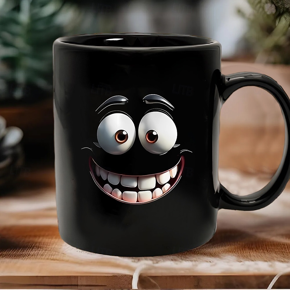 Tasse à café noire amusante avec un grand visage de dessin animé souriant, tasse à thé en céramique de 12 oz, cadeau pour le bureau, la maison, les amis, nouveauté, cadeau d'anniversaire ou de de 2026 ? $16.99 –P1