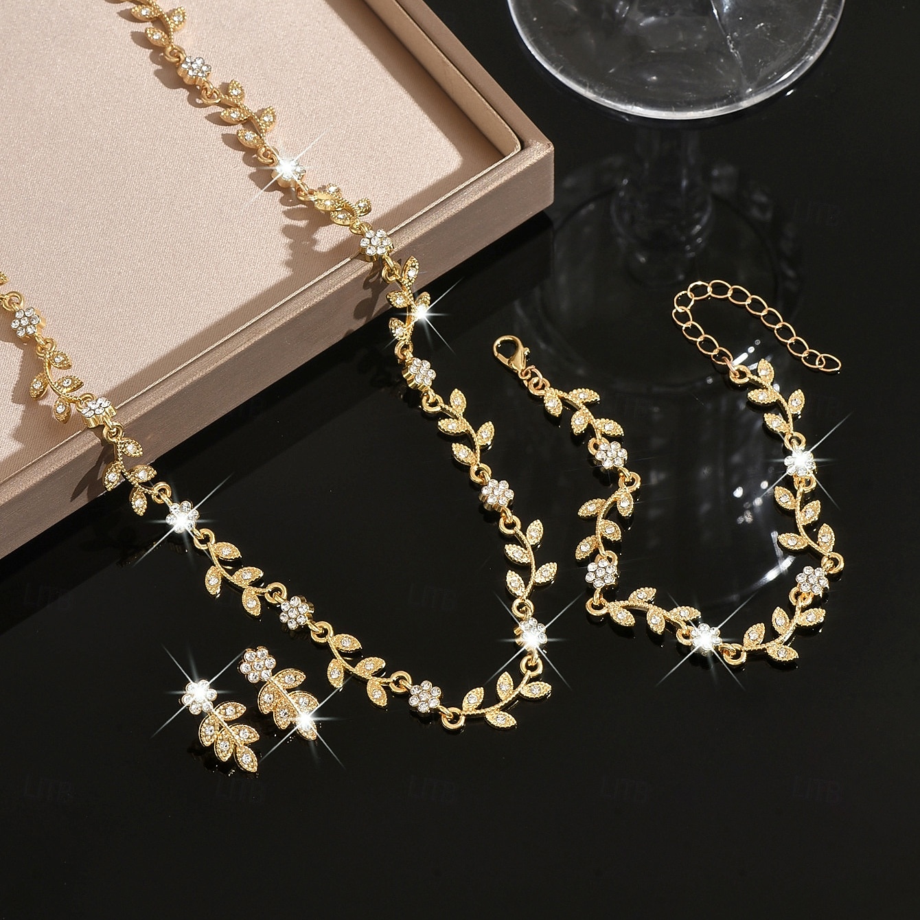 kvinners gullblad &rødt krystallsmykkesett - delikat halskjede, dråpeøreringer &matchende armbånd, romantisk blomstertilbehør til fester, bryllup &spesielle arrangementer 2026 - $19.99 –P4
