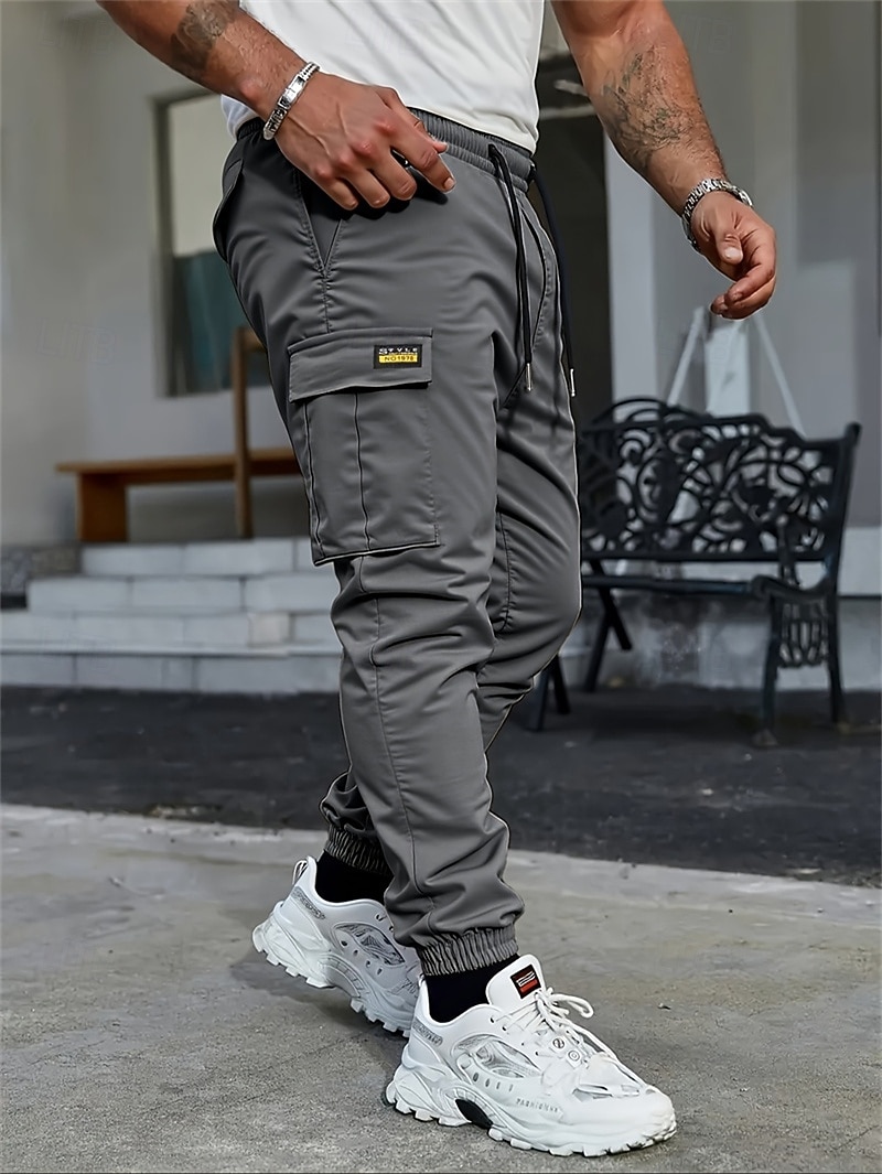 Per uomo Pantaloni Cargo Pantaloni Coulisse Multi-tasche Semplice Indossabile All'aperto Quotidiano Campeggio & Escursionismo Moda Classico Nero Verde militare del 2026 a $24.99 –P10