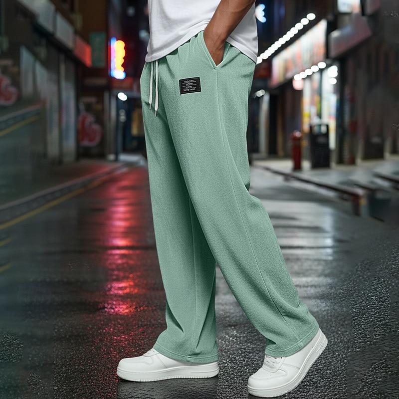 Homens Calças Esportivas Calça de moletom com pernas largas Calças Calças de moletom abertas Com Cordão Cintura elástica Tecido Respirável Comprimento do joelho Esportes Casual Diário Roupa de rua de 2026 por $21.99 –P1
