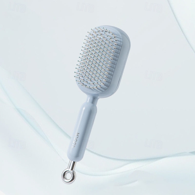 Peine de masaje con cojín retráctil, de diseño portátil para viajes. Cuenta con un anillo de tracción ergonómico, fácil de limpiar y masajeador con cojín de aire, ideal para desenredar cabello grueso 2026 - $16.99 –P7