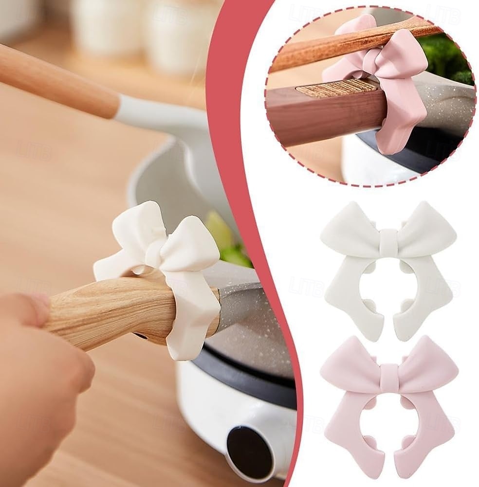 2 ks silikonových podpěr na poklici ve tvaru mašle, roztomilý růžový design mašle, bezpečné uchycení lžiček &metly, držák na kuchyňské náčiní, držák na kuchyňské náčiní, prostorově úsporný kuchyňský 2026 - $10.49 –P2