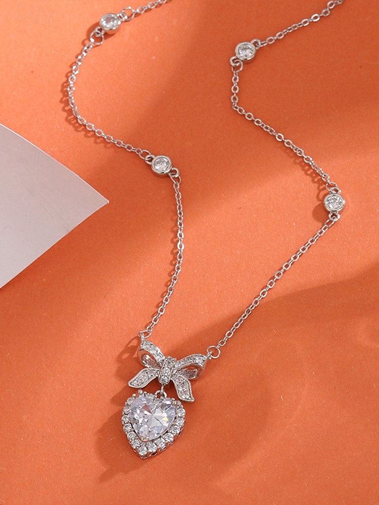 damski naszyjnik ze stopu metali w kształcie serca z kokardką, dostępny w kolorze białym i różowym, idealny na Walentynki 2026 - $11.99 –P7