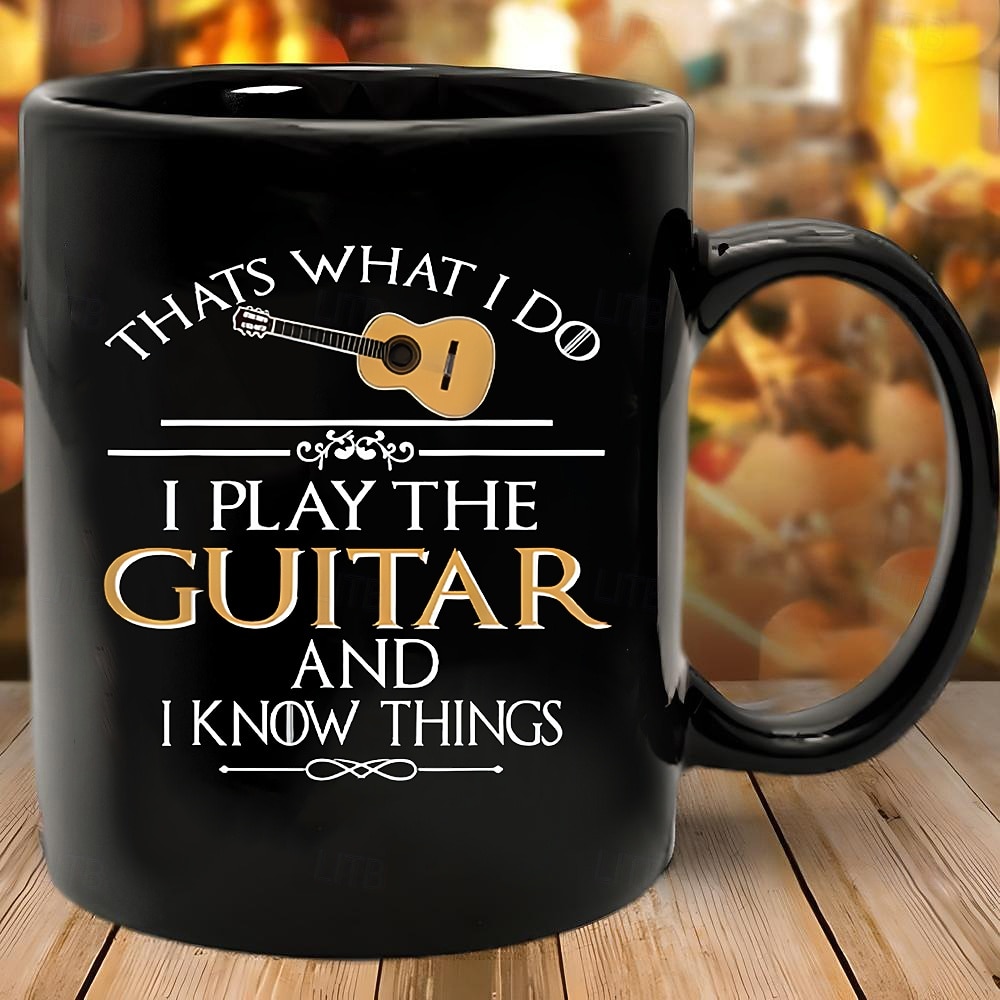 hauska lahjamuki, sitä minä teen, soitan kitaraa ja tiedän asioita, musta keraaminen kahvimuki, humoristinen musiikin ystävän kuppi, lahja kitaristeille, muusikoille, bändin jäsenille ja rock-faneille 2026 - $16.99 –P3
