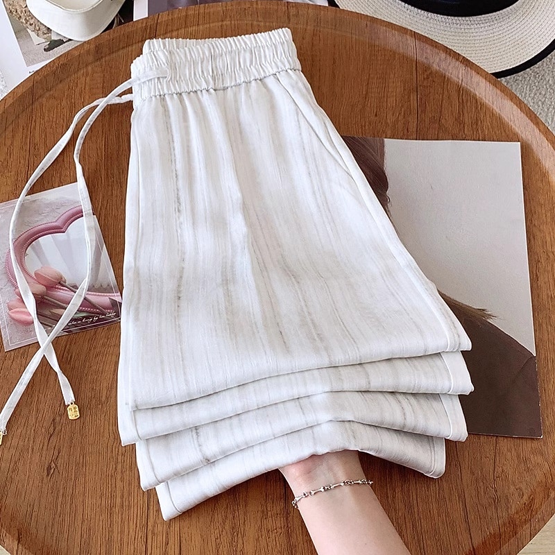 Femmes Jambe large Chinos Vacances Streetwear Basique Longueur complète Taille moyenne Couleur Unie Cordon de serrage Avec Poches Confortable Micro-Élastique Quotidien Extérieur Rue Noir Blanche Kaki de 2026 ? $37.99 –P4