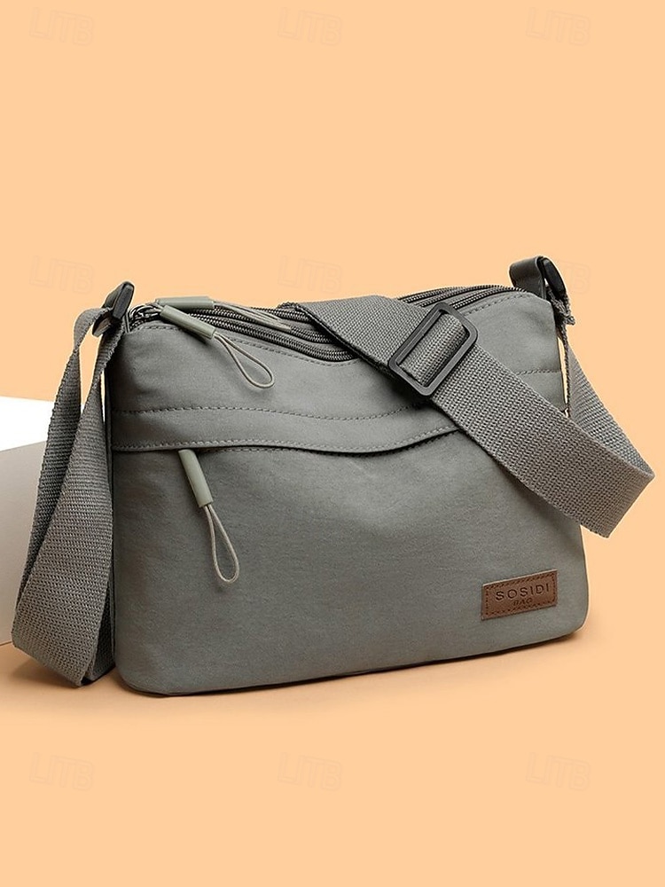 Bolsa transversal feminina em nylon, com grande capacidade, leve e com vários bolsos, ideal para o dia a dia, viagens, compras e uso na cidade. Estilo casual multicolorido. de 2026 por $9.99 –P4