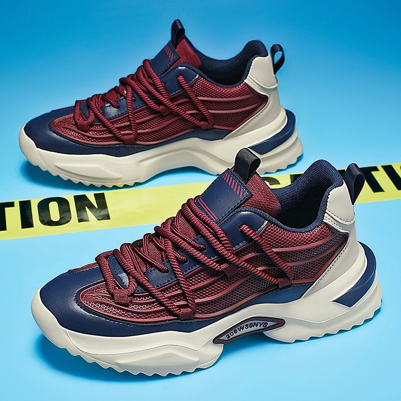 Férfi piros és sötétkék sportcipő, légáteresztő hálós felsőrésszel, könnyű, párnázott talppal, sportos stílusban sétáláshoz, futáshoz és hétköznapi használatra. 2026 - $54.99 –P13