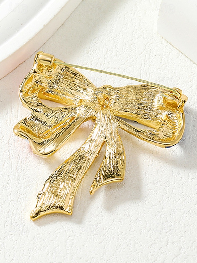 Broche patriote en forme de nœud pour femmes du 250e anniversaire des États-Unis disponible en or et en argent en matériau allié parfait pour les célébrations de l'Amérique et du jour de de 2026 ? $9.99 –P7