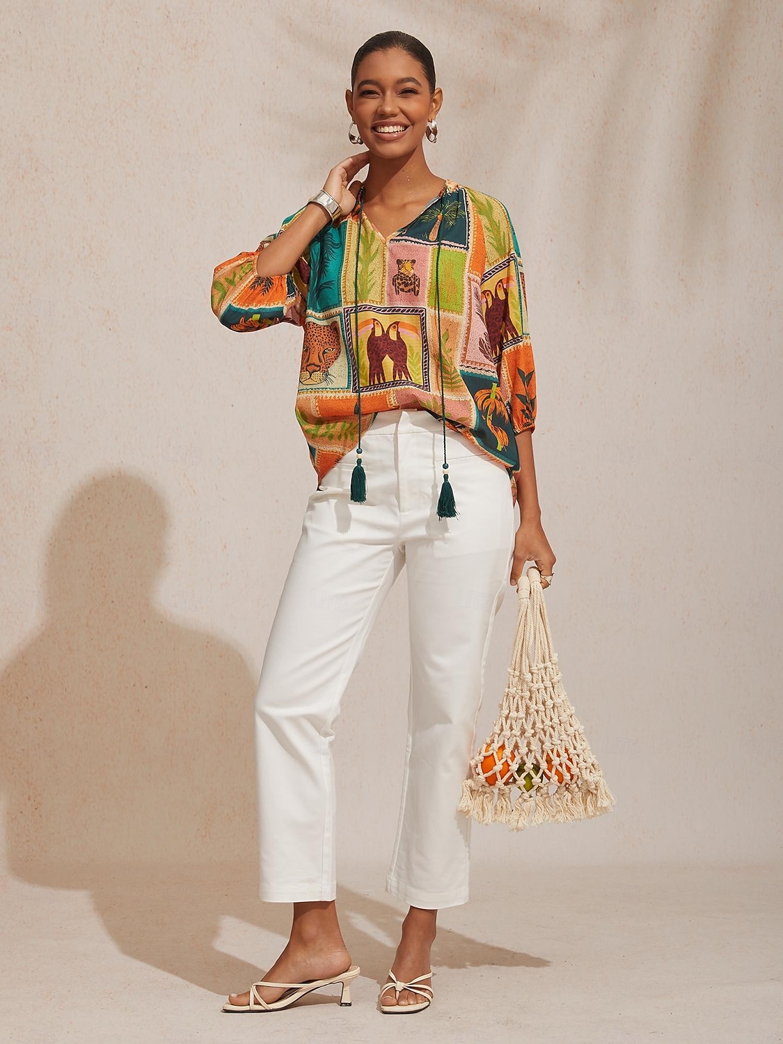 Top in chiffon ampio con motivo floreale tropicale per le vacanze del 2026 a $67.99 –P2