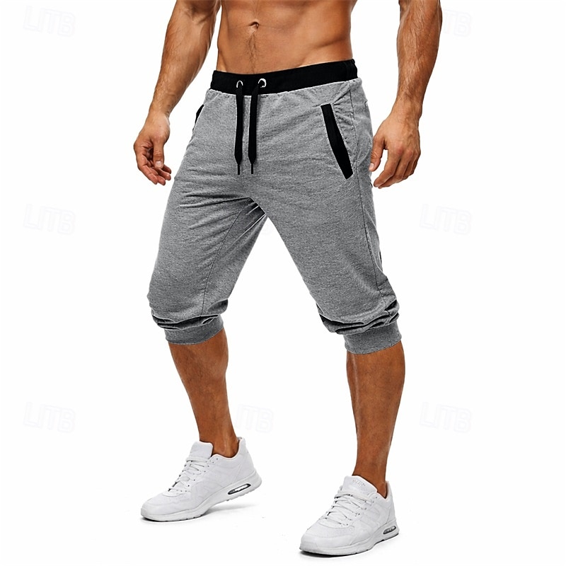 Pánské Aktivní šortky Capri kalhoty Tepláky Kraťasy Šňůrky Elastický pas Jednoduchý Bez vzoru Pohodlné Délka kolen Denní Venkovní Streetwear Sportovní Šik ven Černá Světle šedá Elastické 2026 - $13.49 –P1