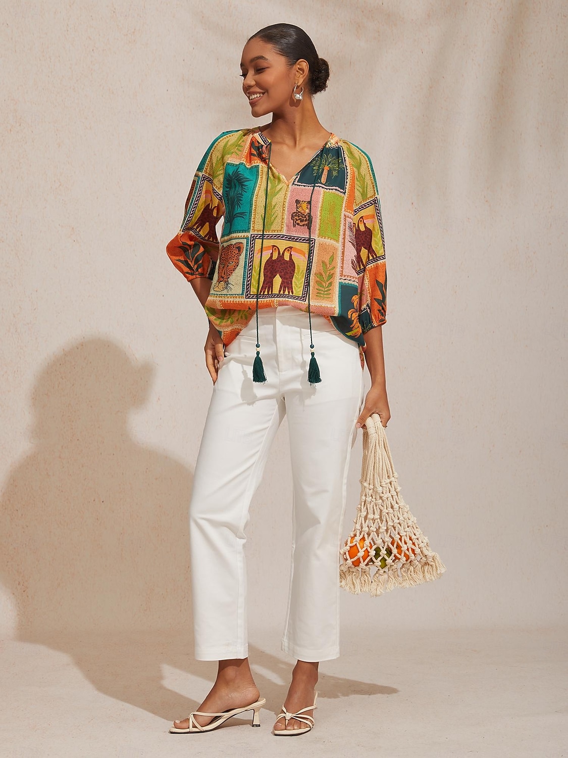 Top in chiffon ampio con motivo floreale tropicale per le vacanze del 2026 a $67.99 –P1