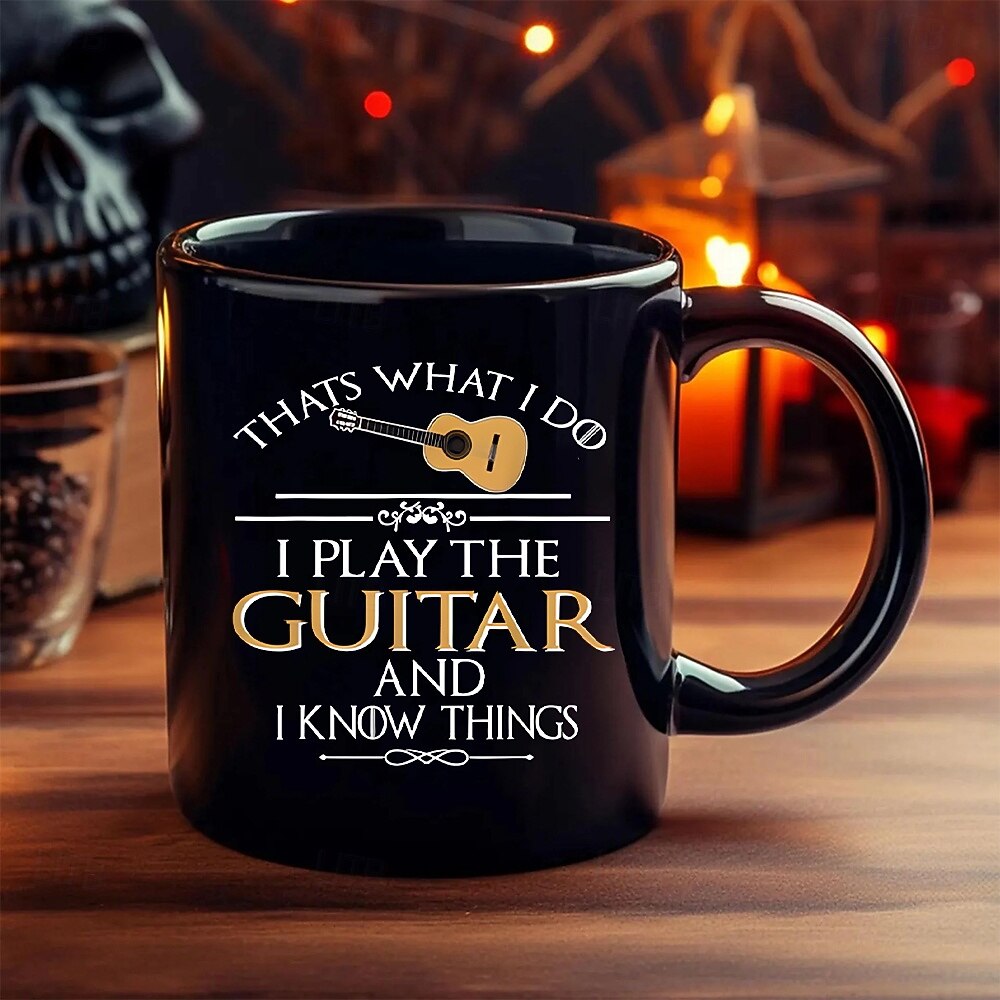 hauska lahjamuki, sitä minä teen, soitan kitaraa ja tiedän asioita, musta keraaminen kahvimuki, humoristinen musiikin ystävän kuppi, lahja kitaristeille, muusikoille, bändin jäsenille ja rock-faneille 2026 - $16.99 –P5